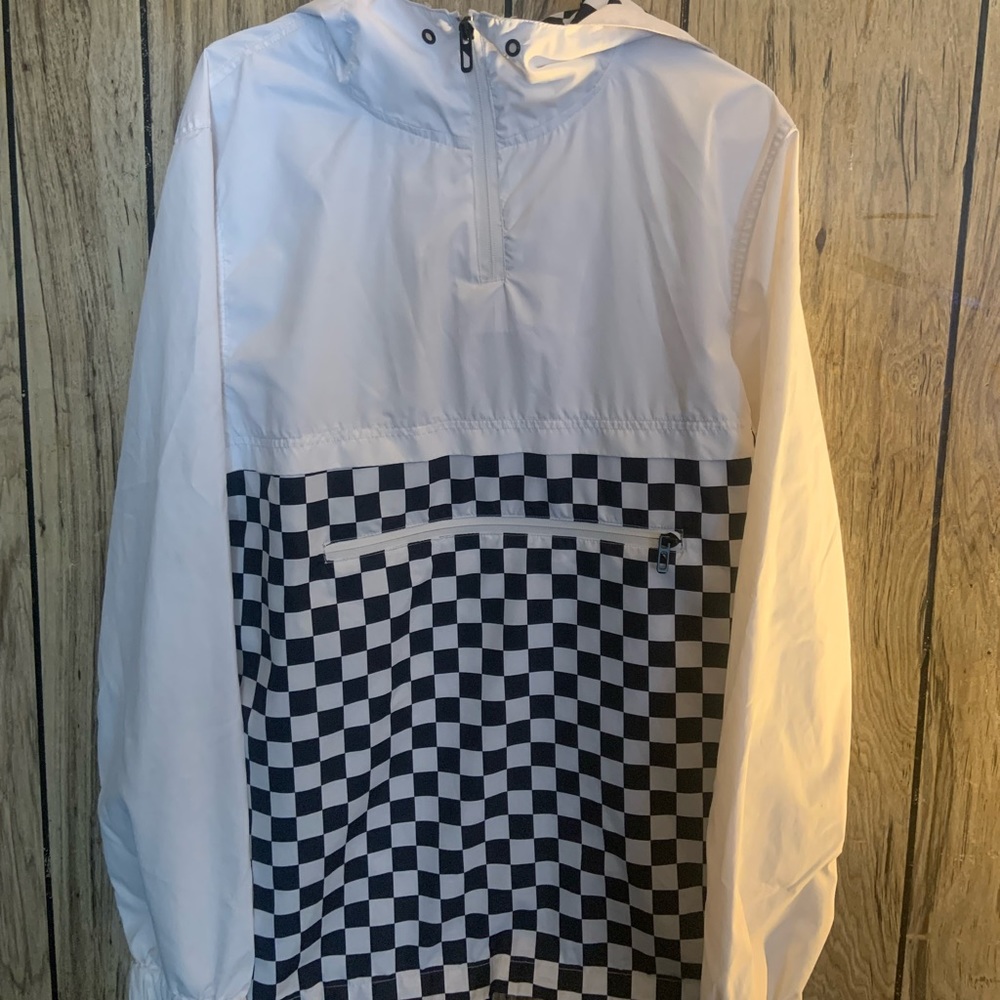 White and Black Checkered jacket.
